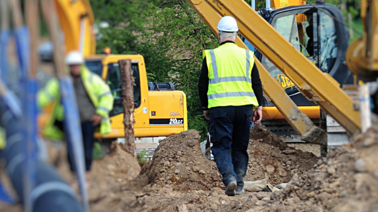 An Uisce Éireann worker on a construction site