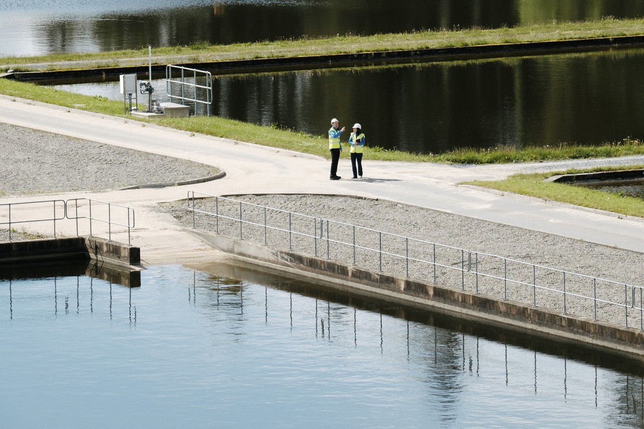 Two Uisce Éireann workers talking at Vartry water treatment plant