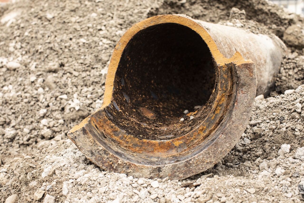 A damaged rusty pipe