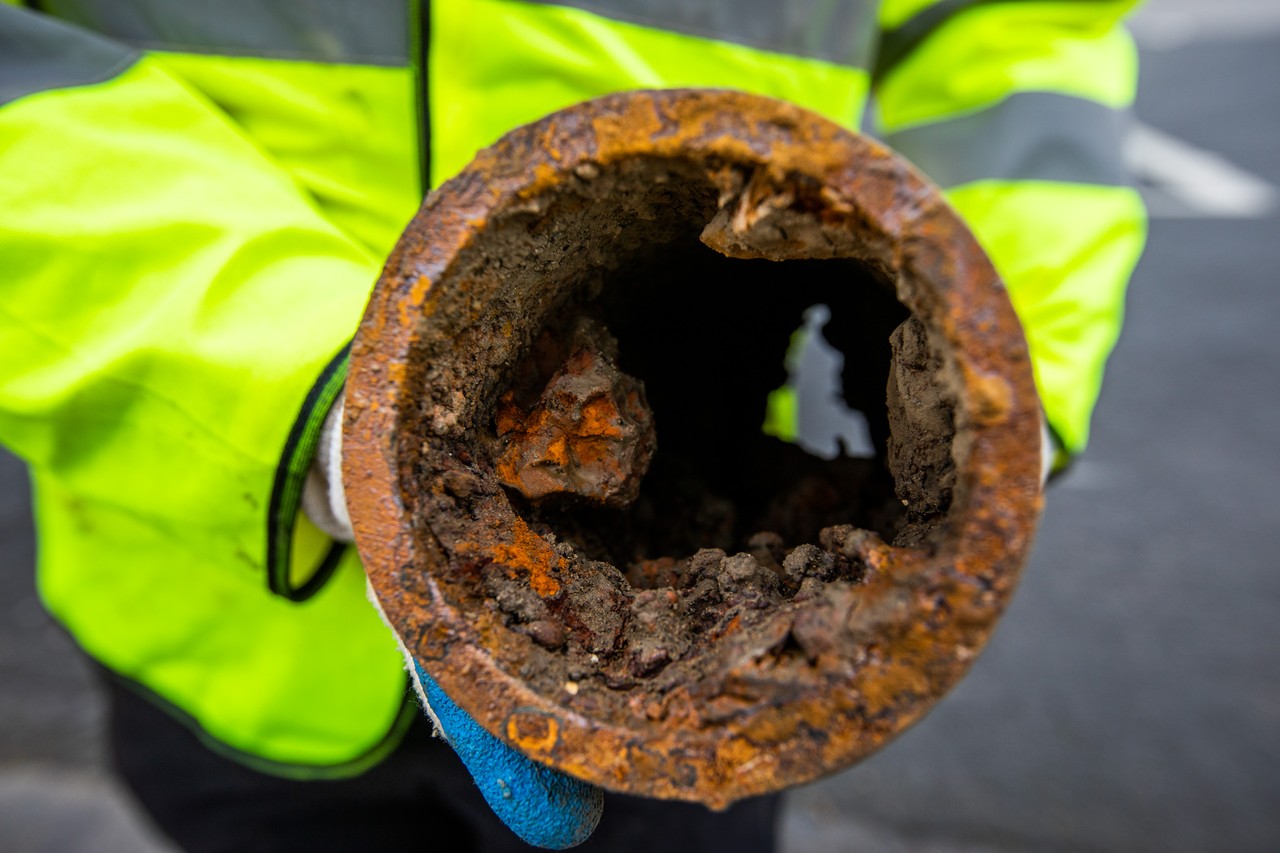 A damaged rusty pipe