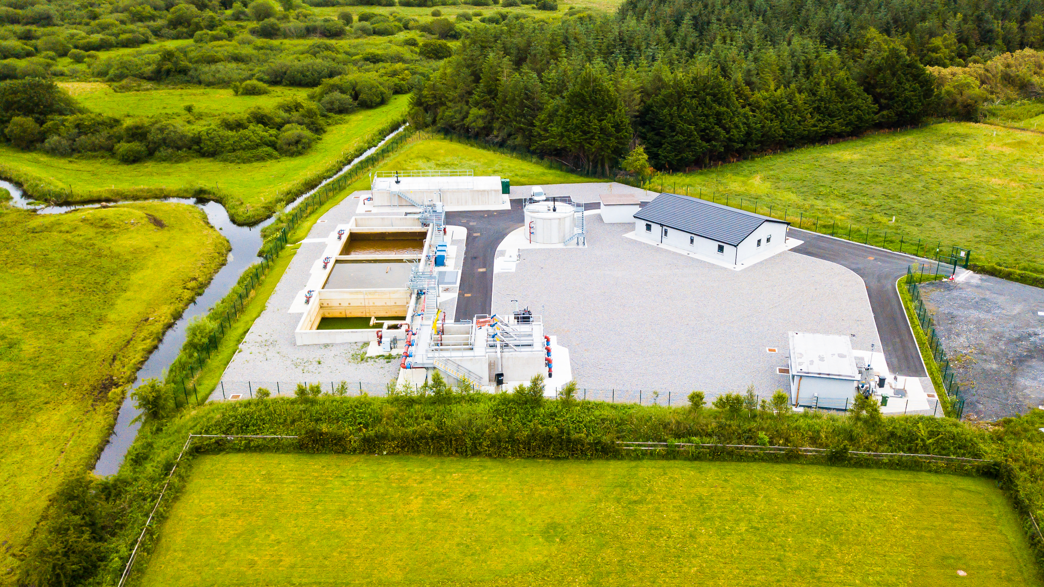 A water treatment facility surrounded by nature