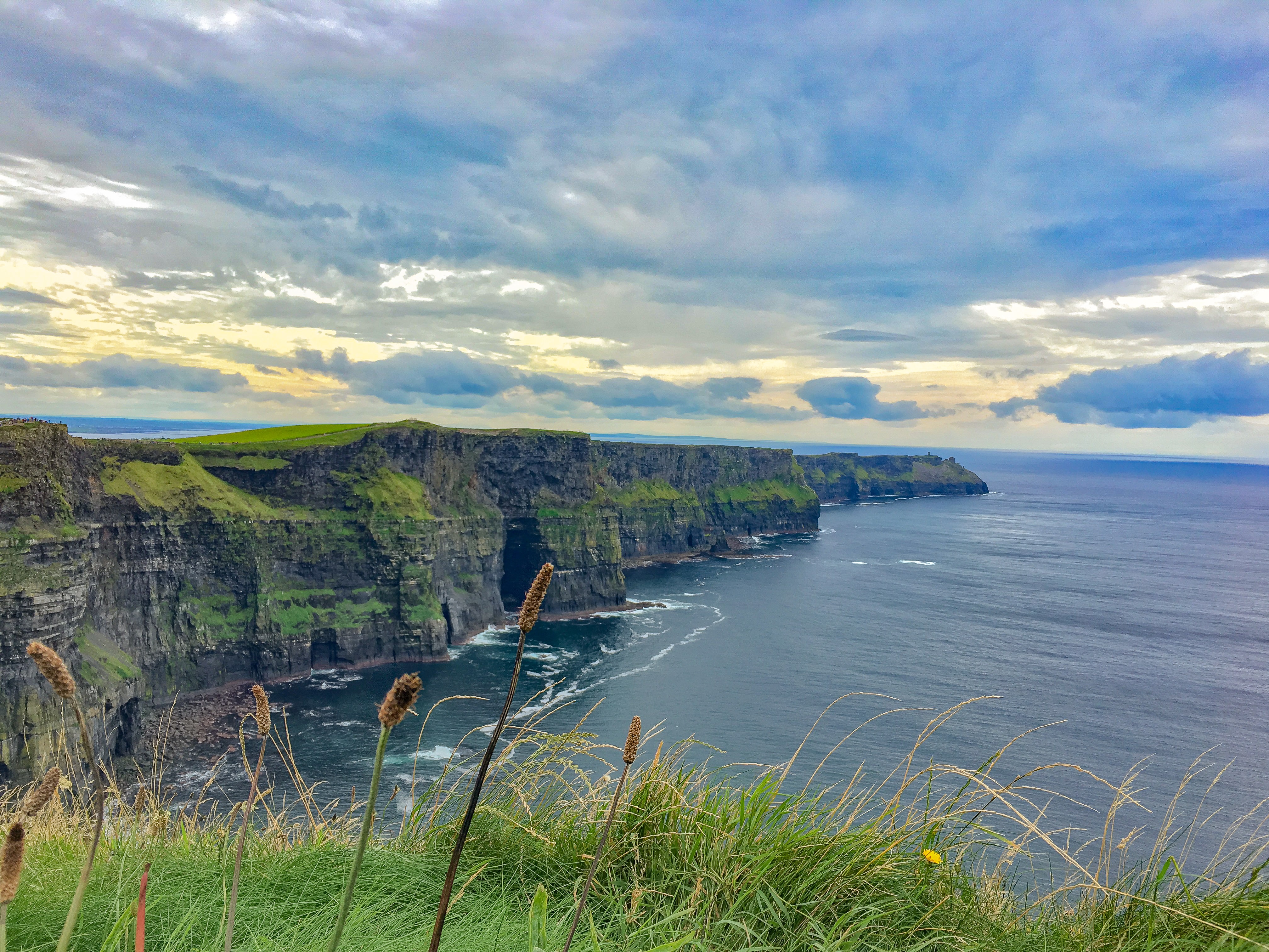 Sea cliffs and a yellow cloudy sky